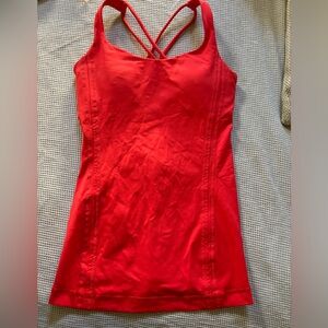 Lululemon strappy bright red workout top has pad that are removable~ sz 2 EUC